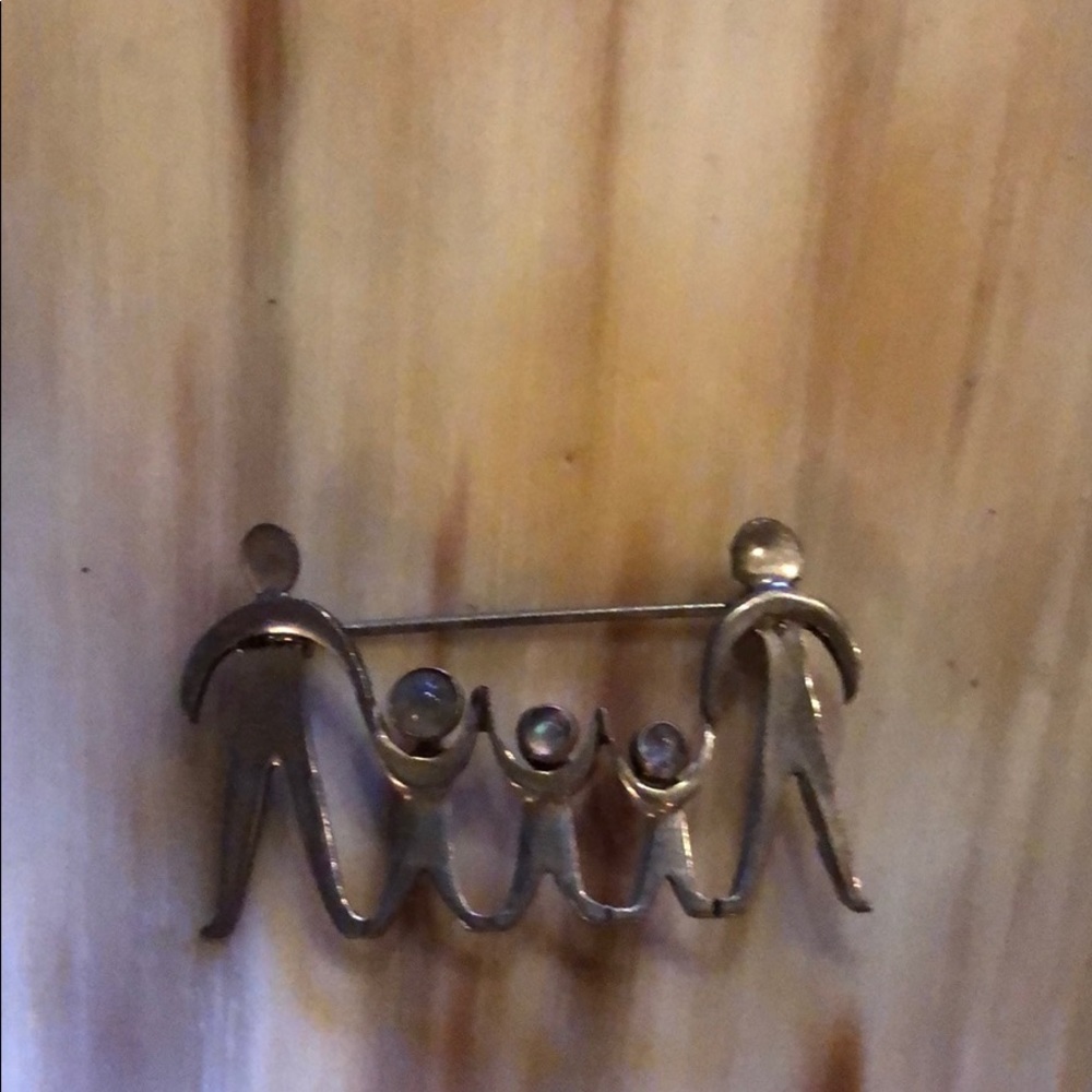 Silver family brooch